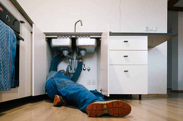Professional Drain Cleaning technician working in Coatsburg, IL